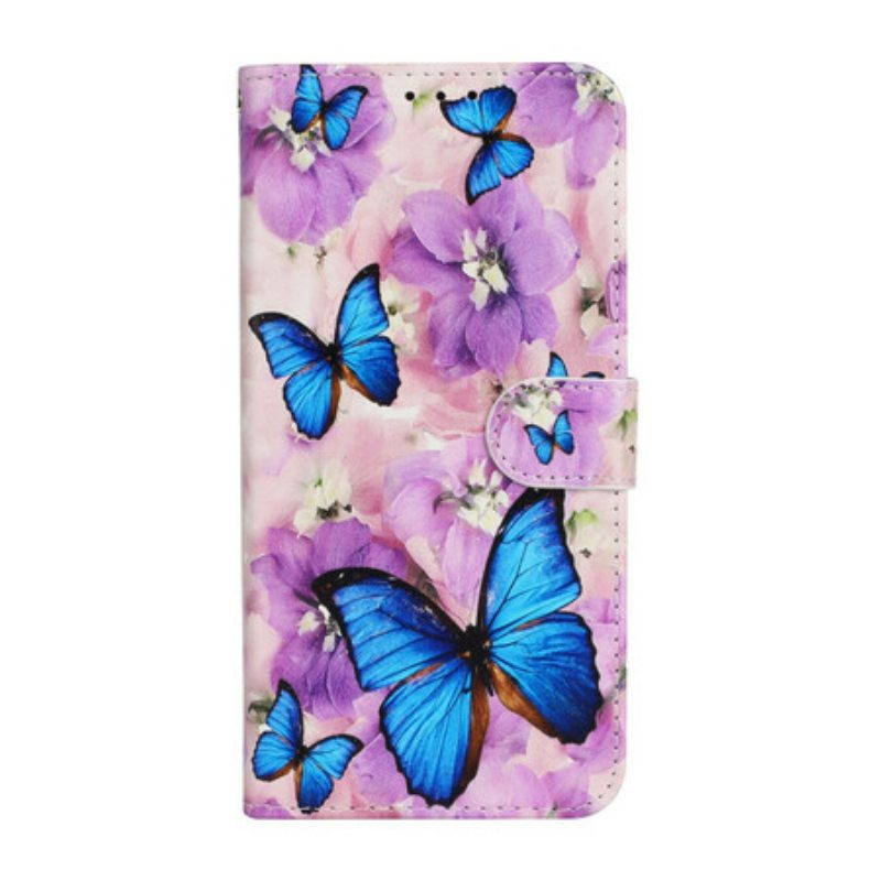 Kotelot iPhone 13 Mini Sinisiä Perhosia Kukissa