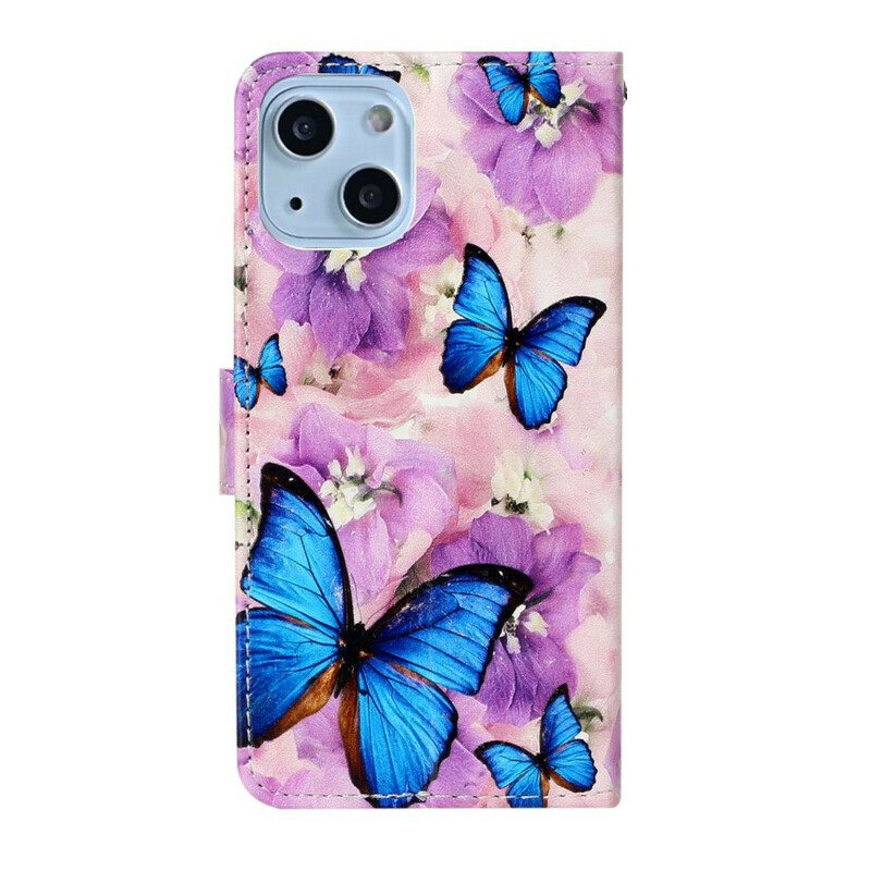 Kotelot iPhone 13 Mini Sinisiä Perhosia Kukissa
