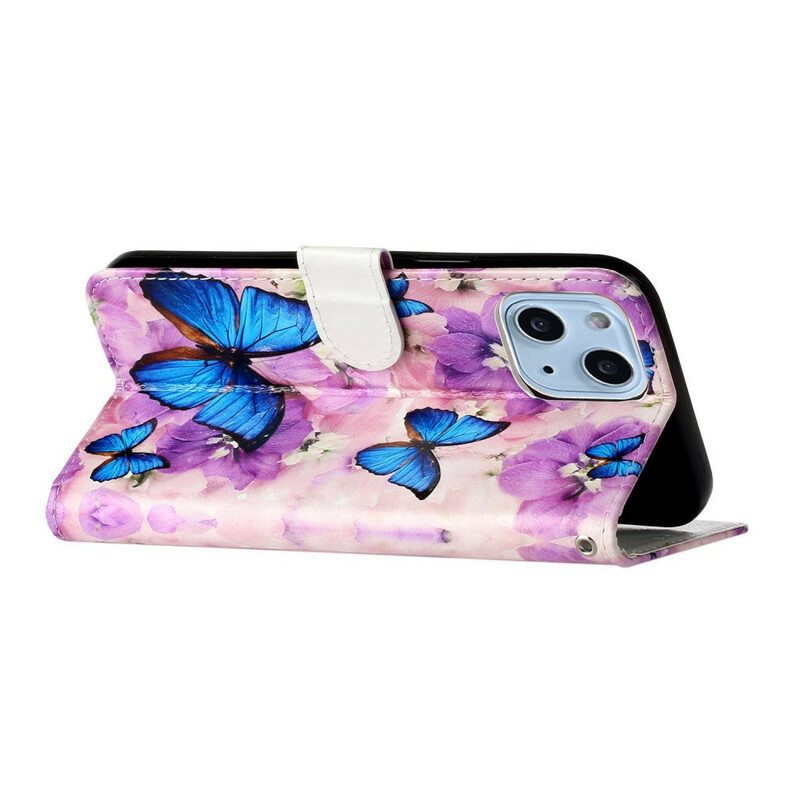 Kotelot iPhone 13 Mini Sinisiä Perhosia Kukissa