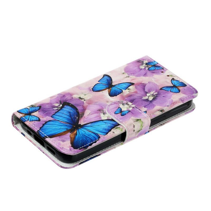 Kotelot iPhone 13 Mini Sinisiä Perhosia Kukissa