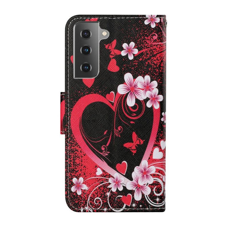 Nahkakotelo Samsung Galaxy S21 FE Kukkia Ja Sydämiä Kaulanauhalla
